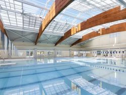 Enjoy Sun or Shade Anytime with a Custom Swimming Pool Retractable Roof