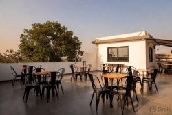 Rooftop Cafe in Hauz Khas At Minimalist Poshtel & Suites